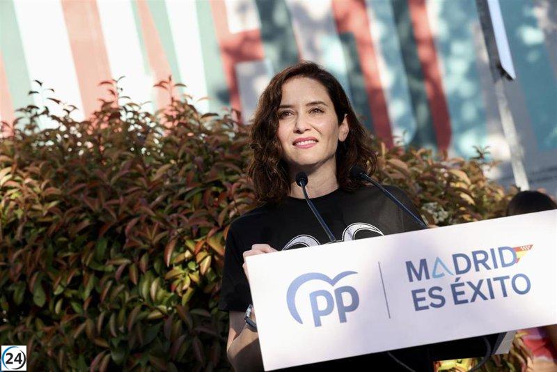 Ayuso critica cortijos de la izquierda en Rivas y recibe insultos de algunos asistentes.