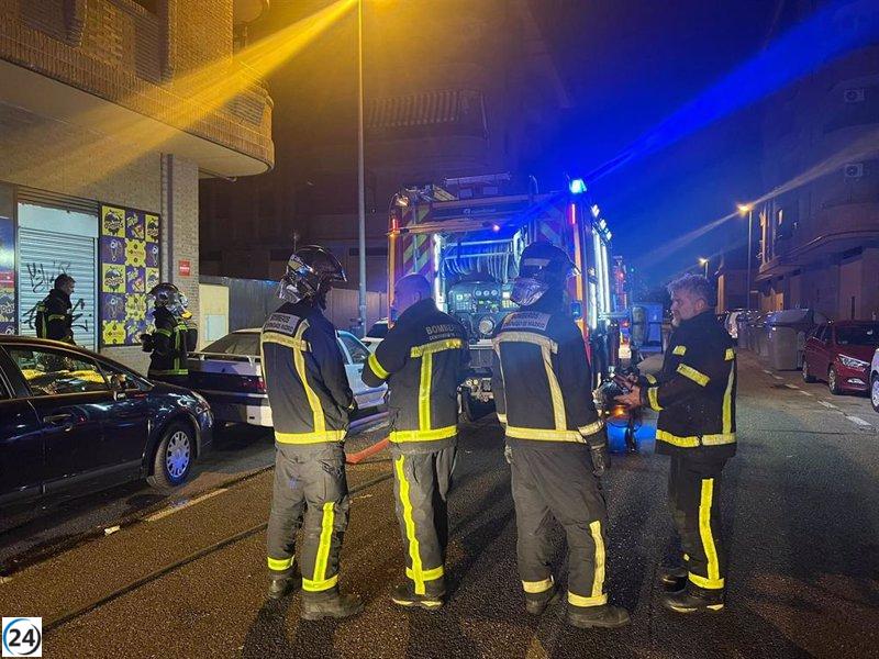 Bomberos madrileños apagan fuego en un garaje de Alcalá de Henares