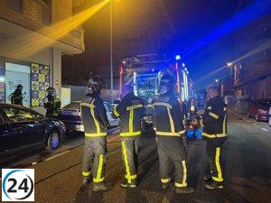 Bomberos madrileños apagan fuego en un garaje de Alcalá de Henares
